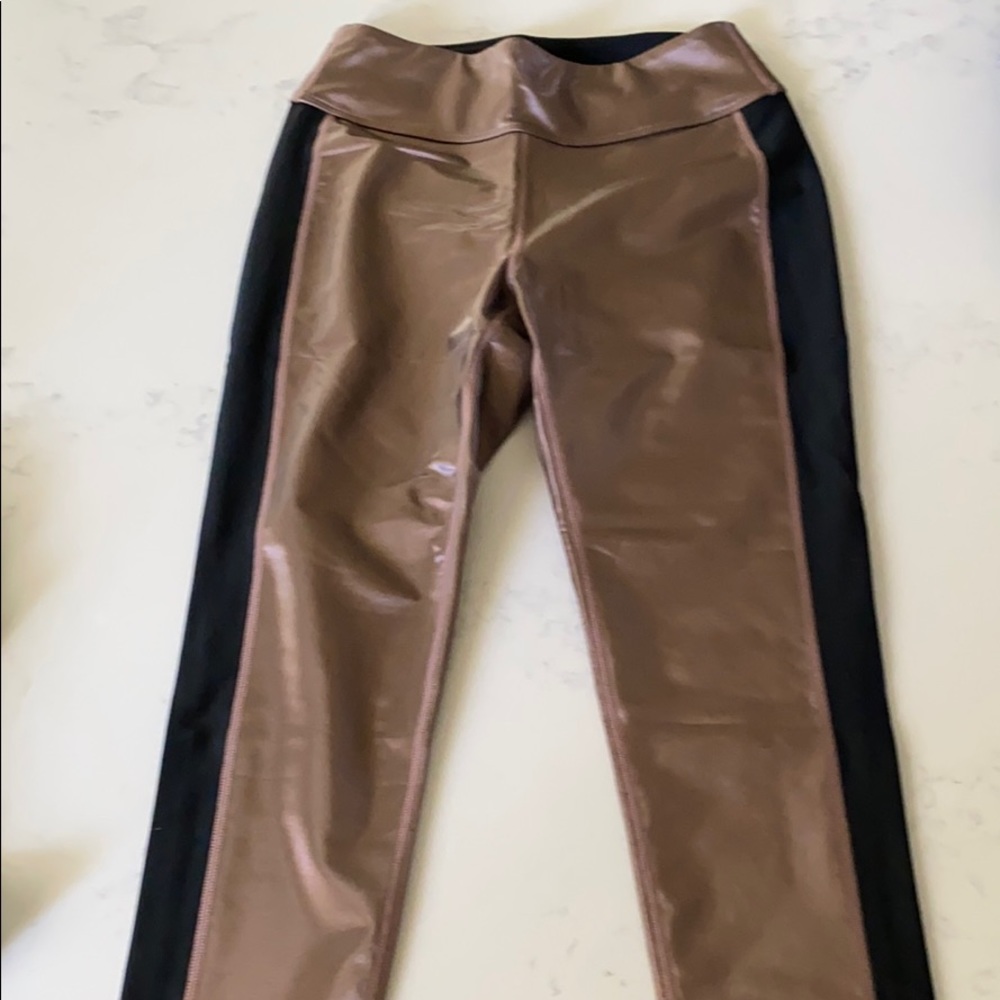 ENSMBL copper leggings with black side stripe